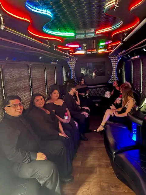 Riders seated inside the party bus